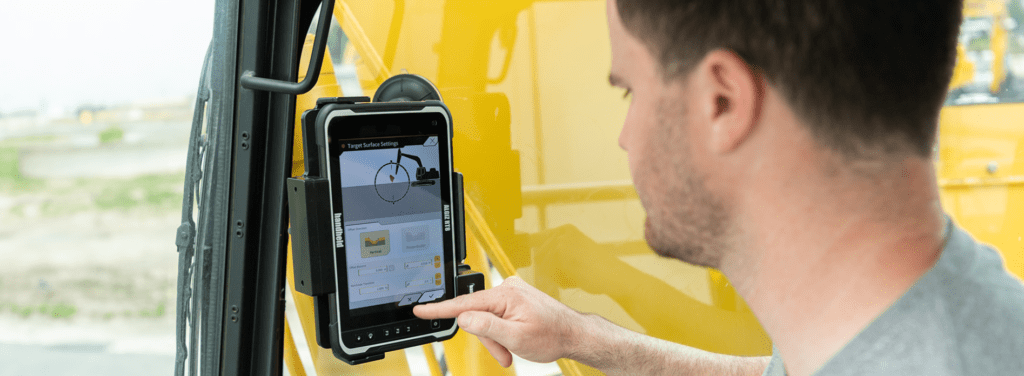 Man using rugged tablet.