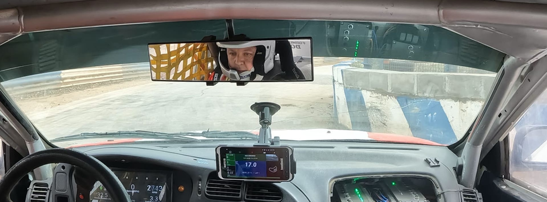 Man riding in a car.