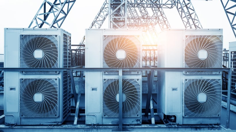  a set of commercial rooftop HVAC (Heating, Ventilation, and Air Conditioning) units