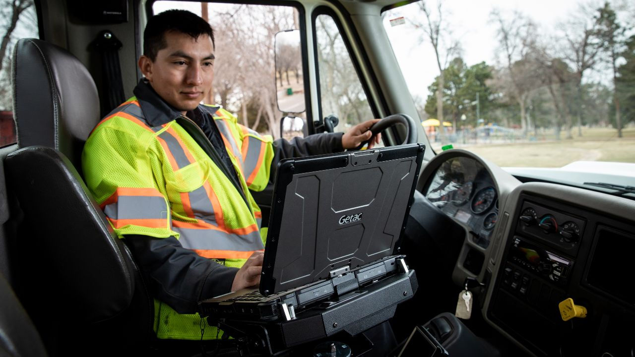Man using the rugged tablet.
